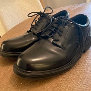 Pair of black patent men’s dress shoes. Great condition